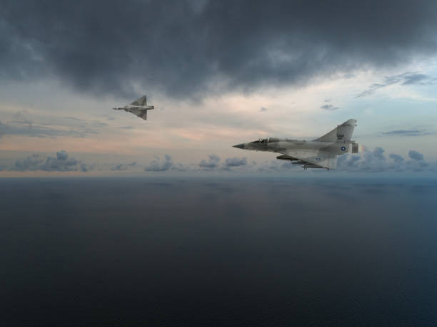 Jet fighters flying over sea.. Mirage 2000 Jet aircraft.