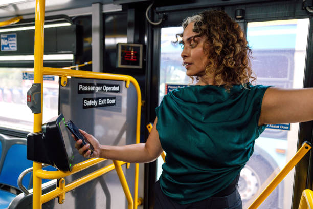 Woman tapping to pay bus ride