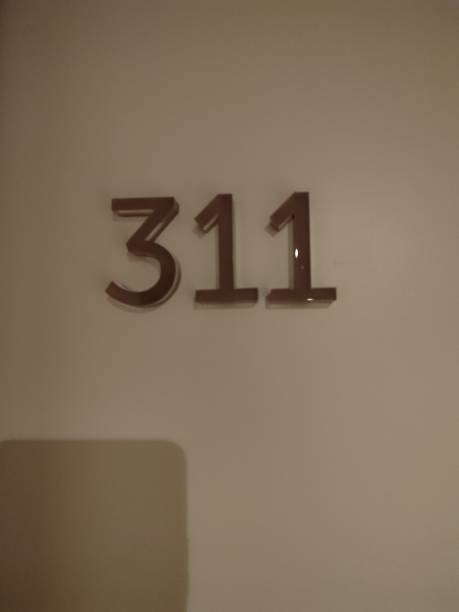 istock The Room Number 311 proudly displayed on a sophisticated wall, adding character and charm 2176959164