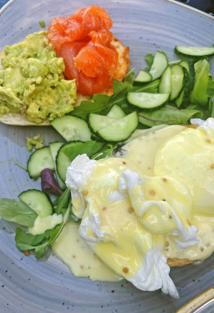 istock Healthy Breakfast, Scrambled Eggs, Salmon and Green Vegetables 2176959730
