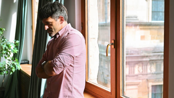 istock Overworked anxious man feeling stressed at home 2176962576