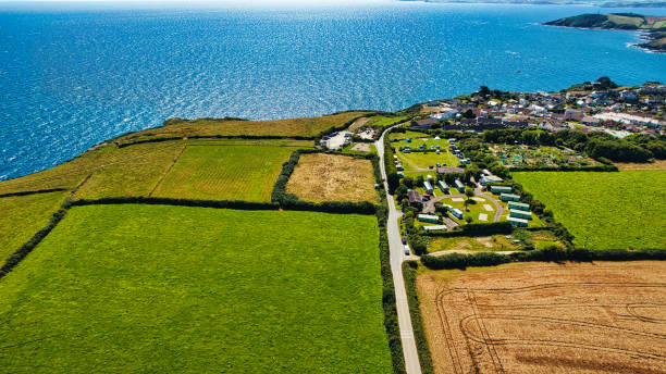 istock Aerial Coastal Landscape with Fields and Village in Cornwall, UK 2176963027