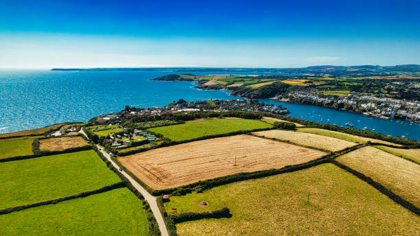 istock Aerial Coastal Landscape with Fields and River in Cornwall, UK 2176963121