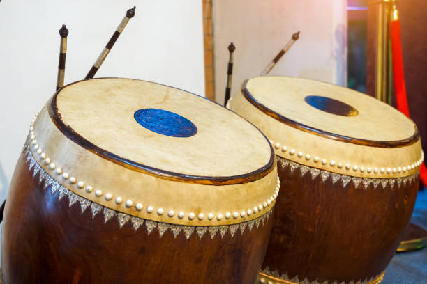 istock Glong thad is a Thai drum. It is a large double-sided drum with 2 balls, one making a high sound and the other making a low sound. Used to play in the Piphat band, playing with Tapone. 2176963302