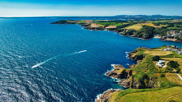 istock Aerial Coastal Landscape with Blue Waters and Green Fields in Cornwall, UK 2176963616