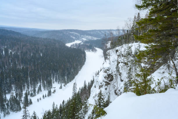 istock Ural River Usva. Winter landscape, snow rocks, hike. Magical winter forest. 2176970428
