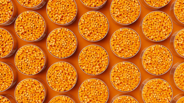 istock Top view on grid of glasses filled with orange plastic polypropylene granules, masterbatch polymer grain. HDPE or PVC resin pellets. 3d render illustration 2176978224