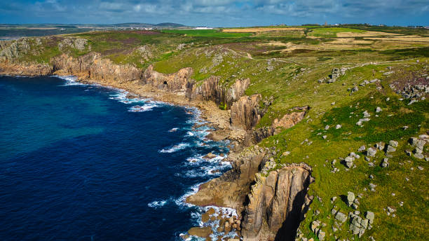 istock Rugged Coastal Cliffs and Blue Sea Aerial View at Land's End, Cornwall, UK 2176979531
