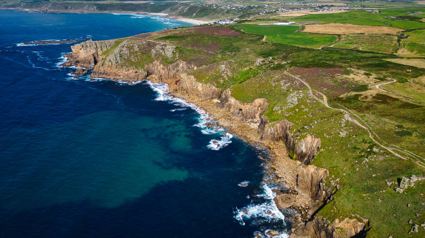 istock Aerial View of Rugged Coastline and Cliffs at Land's End, Cornwall, UK 2176979537