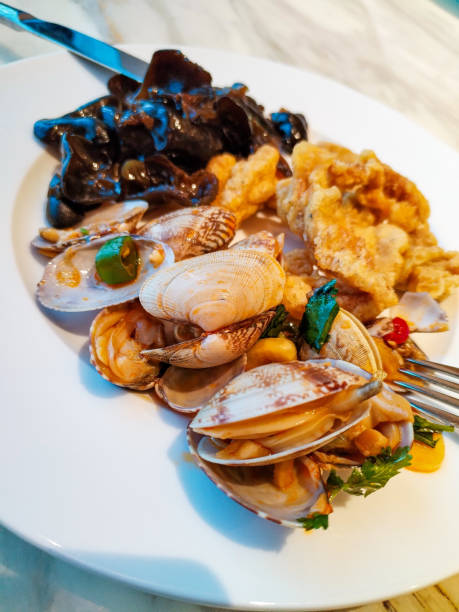 istock Sea shells are food with hot peppers 2176985300