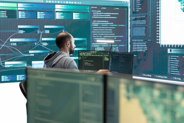 istock Governmental hackers analyzing cyber threats on big screens 2176986088