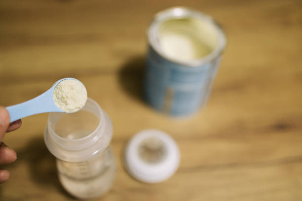 istock Preparing milk formula for baby 2176989566