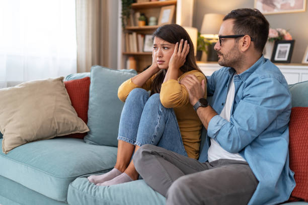 istock Man comforting his sad wife 2176991051