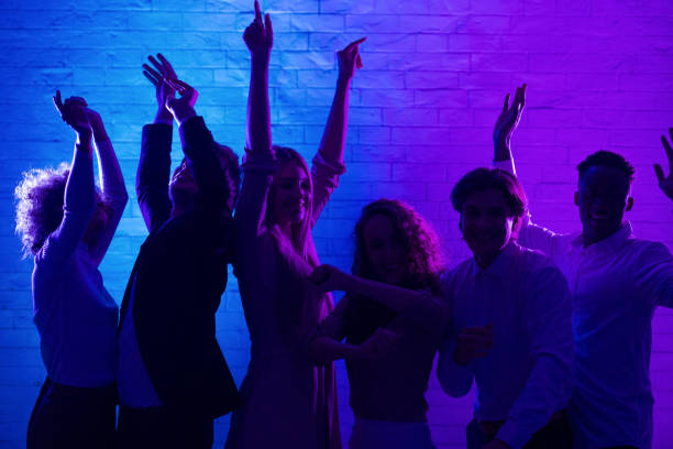 istock Joyful Millennial People Dancing Having Party In Office At Night 2176992607
