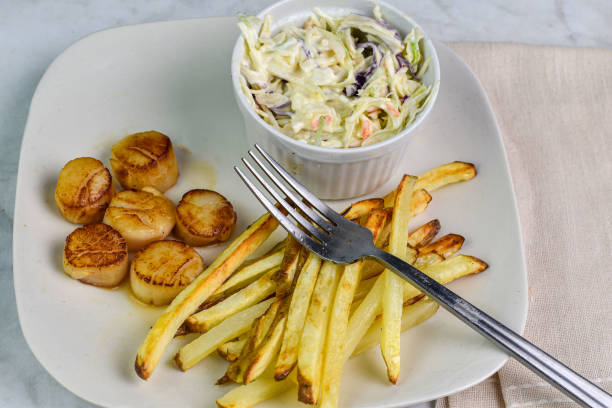 pan sheared scallops  served with home made french fries and cole slaw