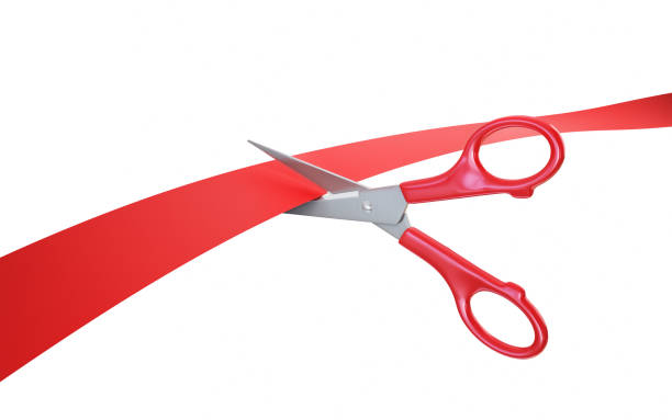 istock Red Handled Metallic Scissors Cutting Red Ribbon, Clipping Path 2176996398