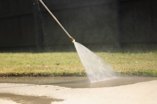 istock Pressure Washing Driveway - Fence and Grass 2177004898