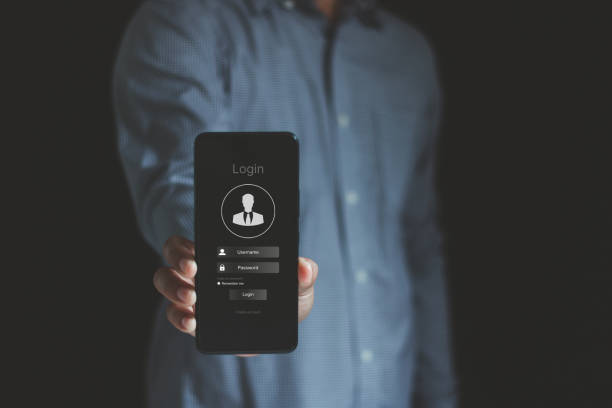 istock Cyber security concept. Business people holding smartphone show login interface on mobile phone screen with username password boxes and login button to access personal account in mobile application. 2177005661