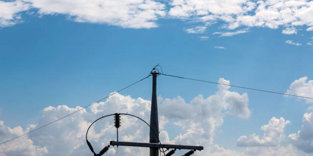 istock Electric poles with a beautiful cloudy sky in the background 2177018473