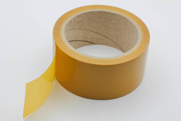 istock Roll of yellow duct tape on a white background 2177021022