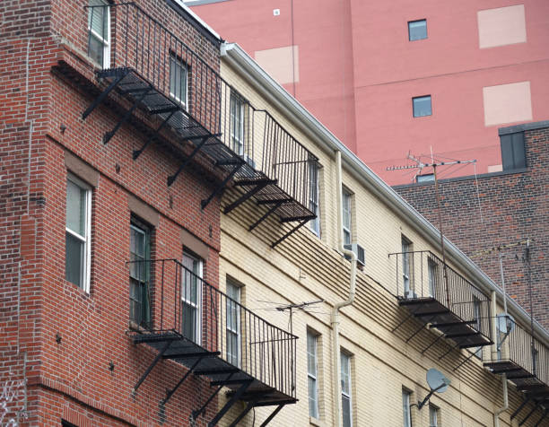 Close up on ancient brick wall apartment building on Boston downtown