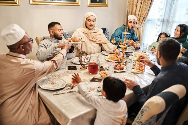 istock Multi-generation muslim family sharing food for Eid at home during Ramadan 2177023092
