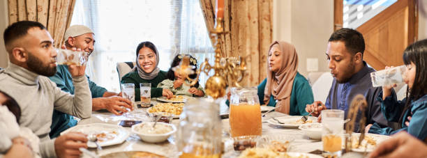 istock Muslim family having dinner together during Eid 2177023211