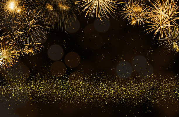 istock Golden celebration fireworks with abstract glitter and bokeh background 2177026918