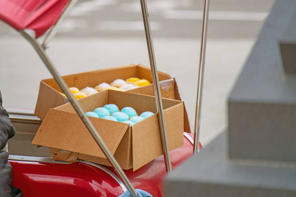 vibrant display of colorful ice cream in open boxes, showcasing a delightful array of flavors. The enticing sight promises a refreshing treat, perfect for a warm day
