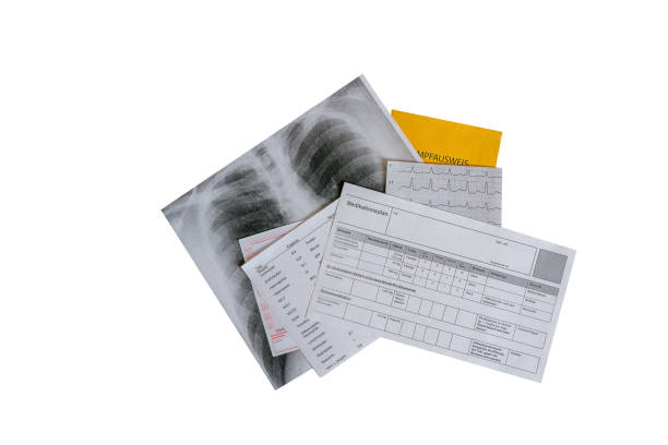 Medical documents lie staggered on top of each other on a white background, horizontal
