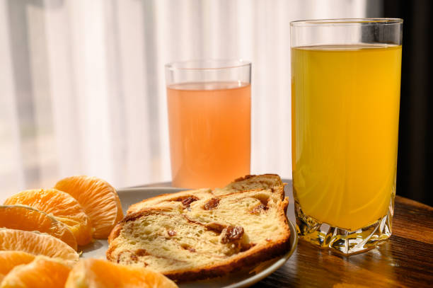 Sweet breakfast, cake and fruit juice on the table