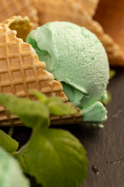 istock green ice cream with mint flavor on a black slate surface 2177051796