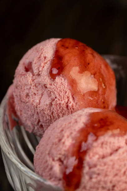 istock red strawberry ice cream in a glass bowl 2177051818