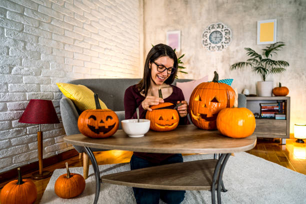 istock Woman making Halloween decorations 2177053672