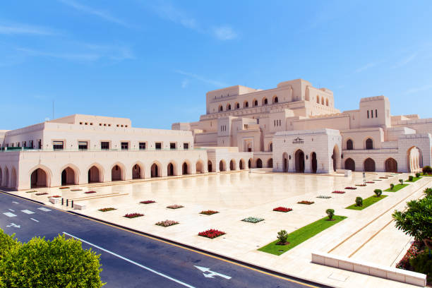Muscat, Oman - May 27, 2024: Royal Opera House in Muscat with reflections on polished marble floor in front. Sultanate of Oman