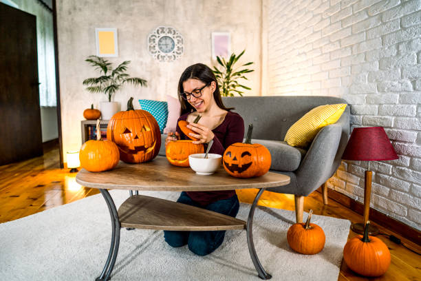 istock Woman preparing decorations for Halloween 2177054697