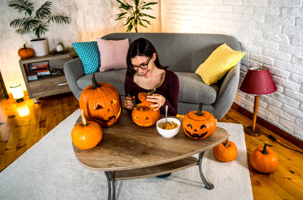 istock Woman making Halloween decorations 2177054703