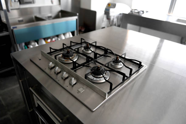 Modern kitchen gas hob  on shelves background