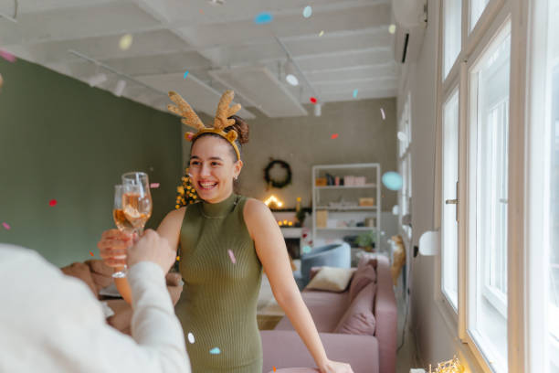 istock Young couple toasting during the Christmas brunch 2177060153