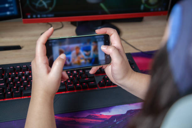 istock Woman playing online game with smartphone 2177060188