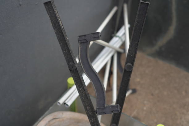istock A discarded black plastic handle with a metal rod 2177060392