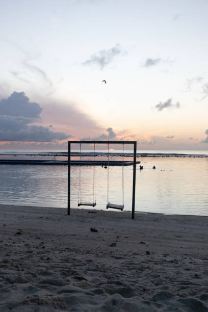 istock Hulhumale sunrise beach captions in Maldives with swing 2177061663