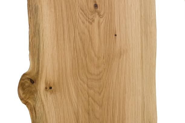 istock Oak plank with scratches, cracks and holes filled with epoxy, surface treated with  wax. 2177064087