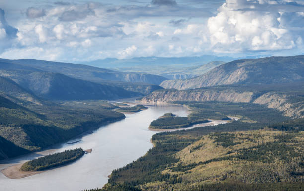 Evening overview of the Yukon River as seen from the Midnight Dome in Dawson City, Yukon, Canada