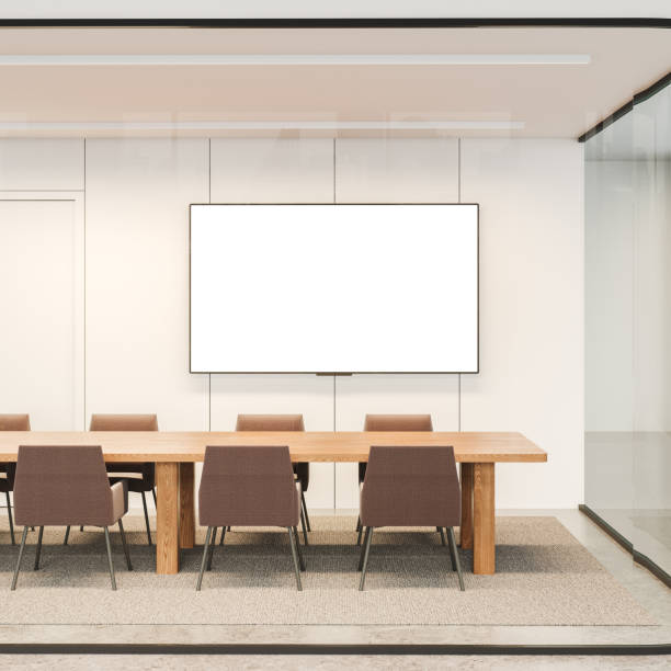 istock Modern office room interior with meeting table and mock up tv screen 2177065637