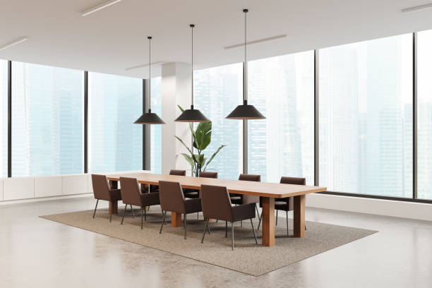 istock Modern office meeting room with long wooden table and chairs. 3D Rendering 2177066094