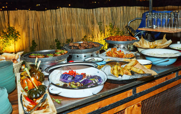 istock Outdoor Buffet Table with Variety of Dishes 2177068744