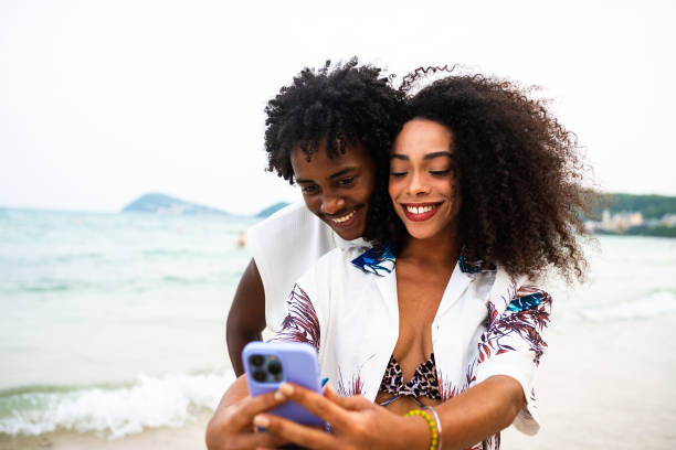 istock Black couple's happy moments at the beach 2177072322
