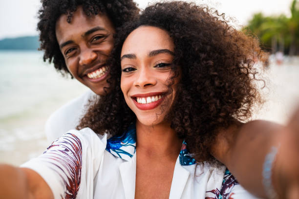istock Young Black couple's close-up beach selfie 2177072341