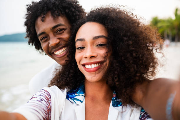 istock Happy Black couple's close-up beach selfie 2177072385